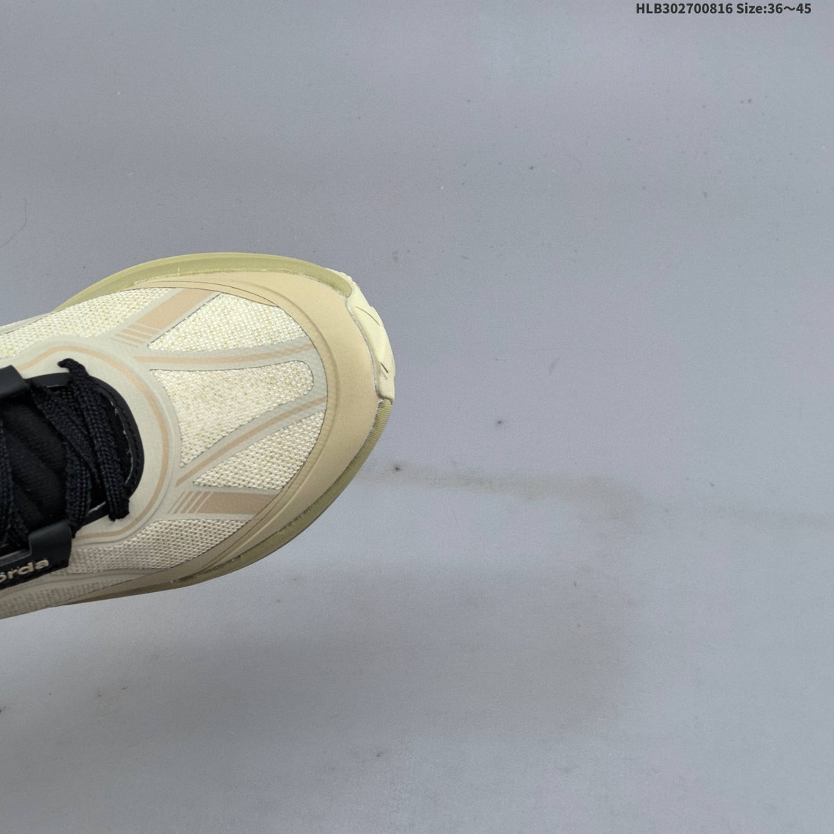 Cream and Black Norda 055 Trail Running Shoes - product image from the listing.