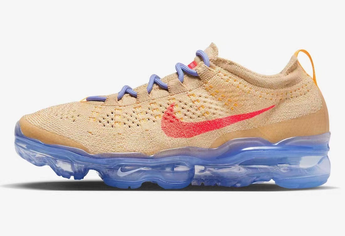 Tan and Blue Nike Air VaporMax Flyknit Sneakers - product image from the listing.