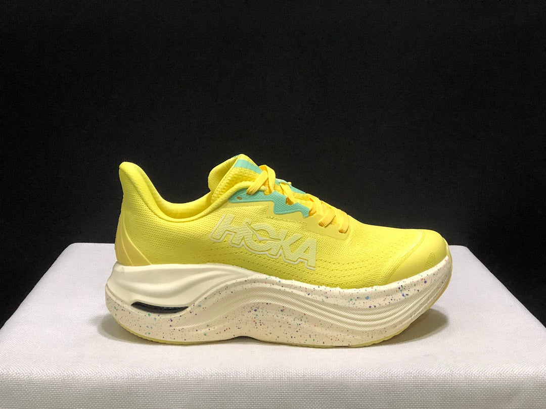 Yellow and Aqua HOKA Skyward X Running Shoes - product image from the listing.