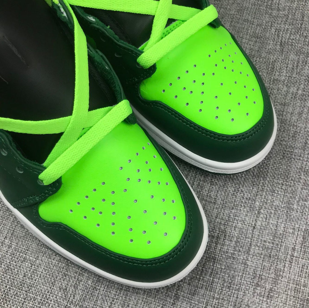 Air Jordan 1 Mid Fluorescent Sneakers in Green 554724-330 - product image from the listing.