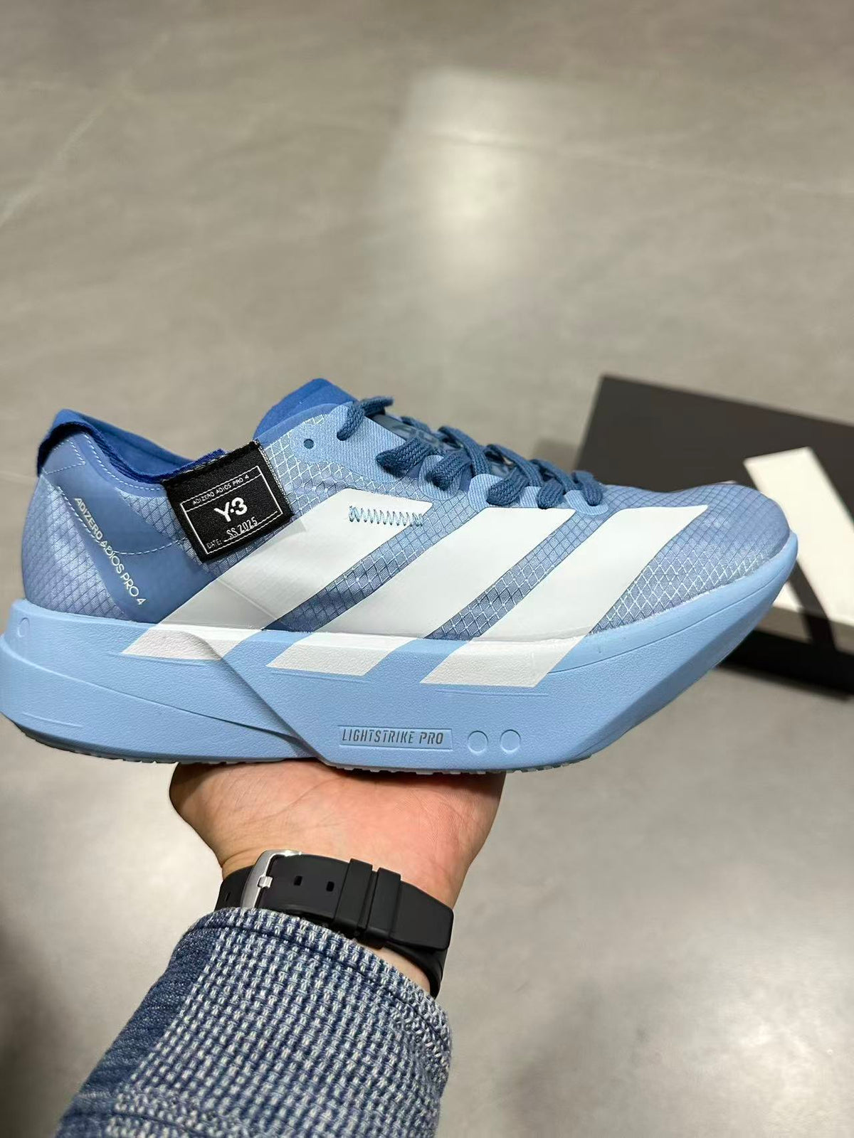 Blue Adidas Lightstrike Pro Running Shoes - product image from the listing.