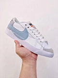 Nike Blazer Low 07 Sneakers in White and Light Blue - product image from the listing.