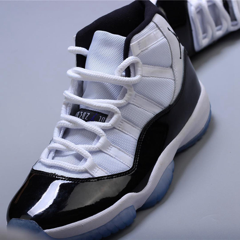 Air Jordan 11 Concord Black White Sneakers - product image from the listing.