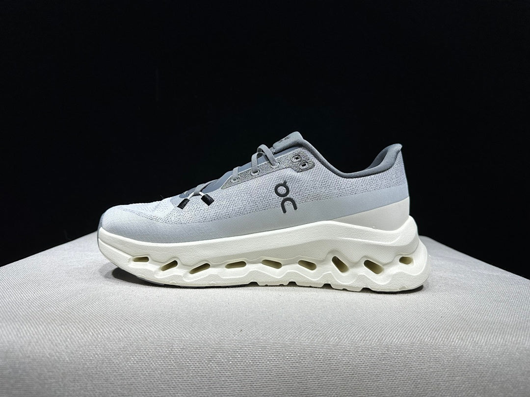 On Cloudtilt Sneakers, in Gray and White - product image from the listing.