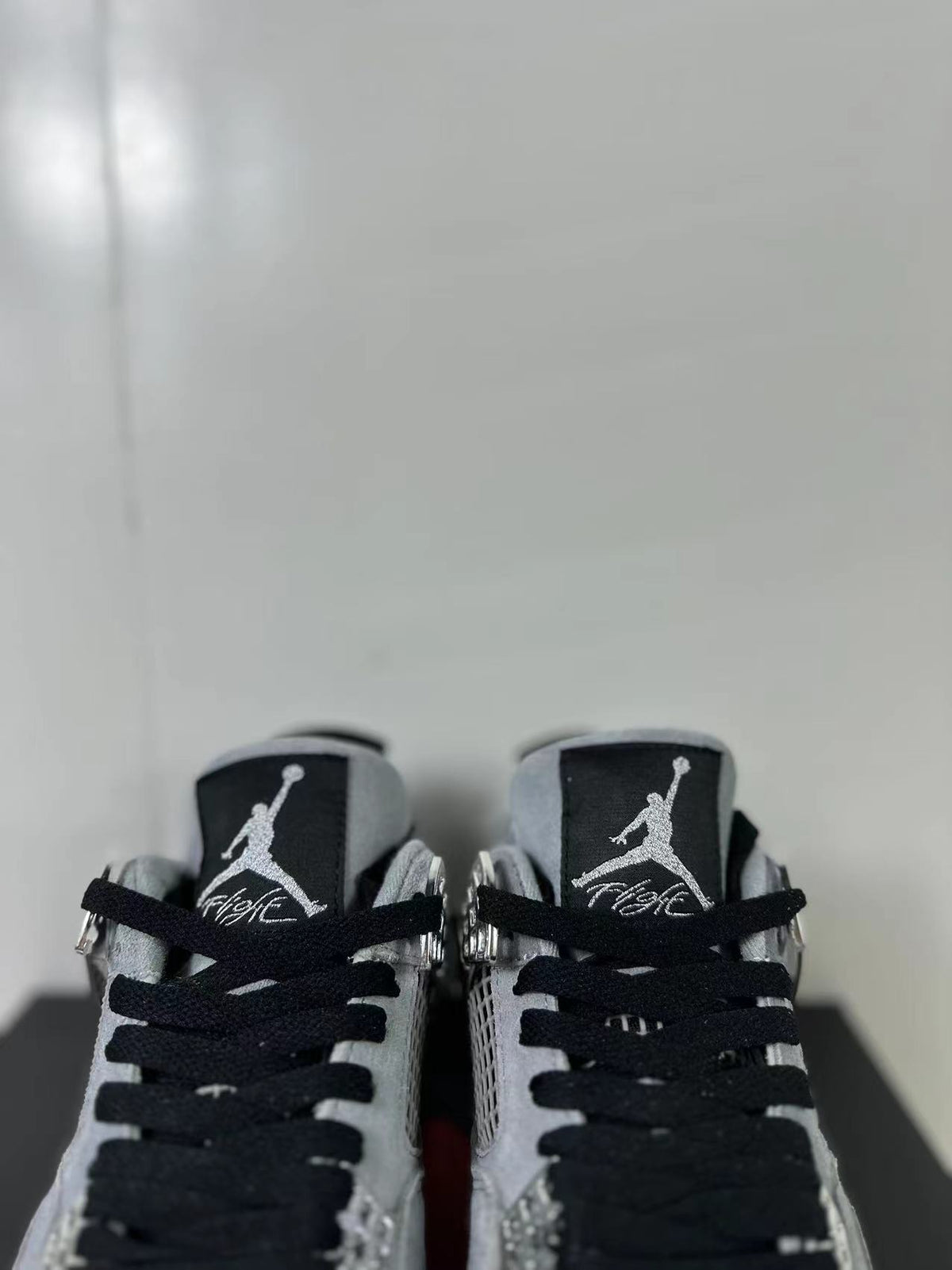 Air Jordan 4 Retro Gray Black Sneakers AQ9129-005 - product image from the listing.