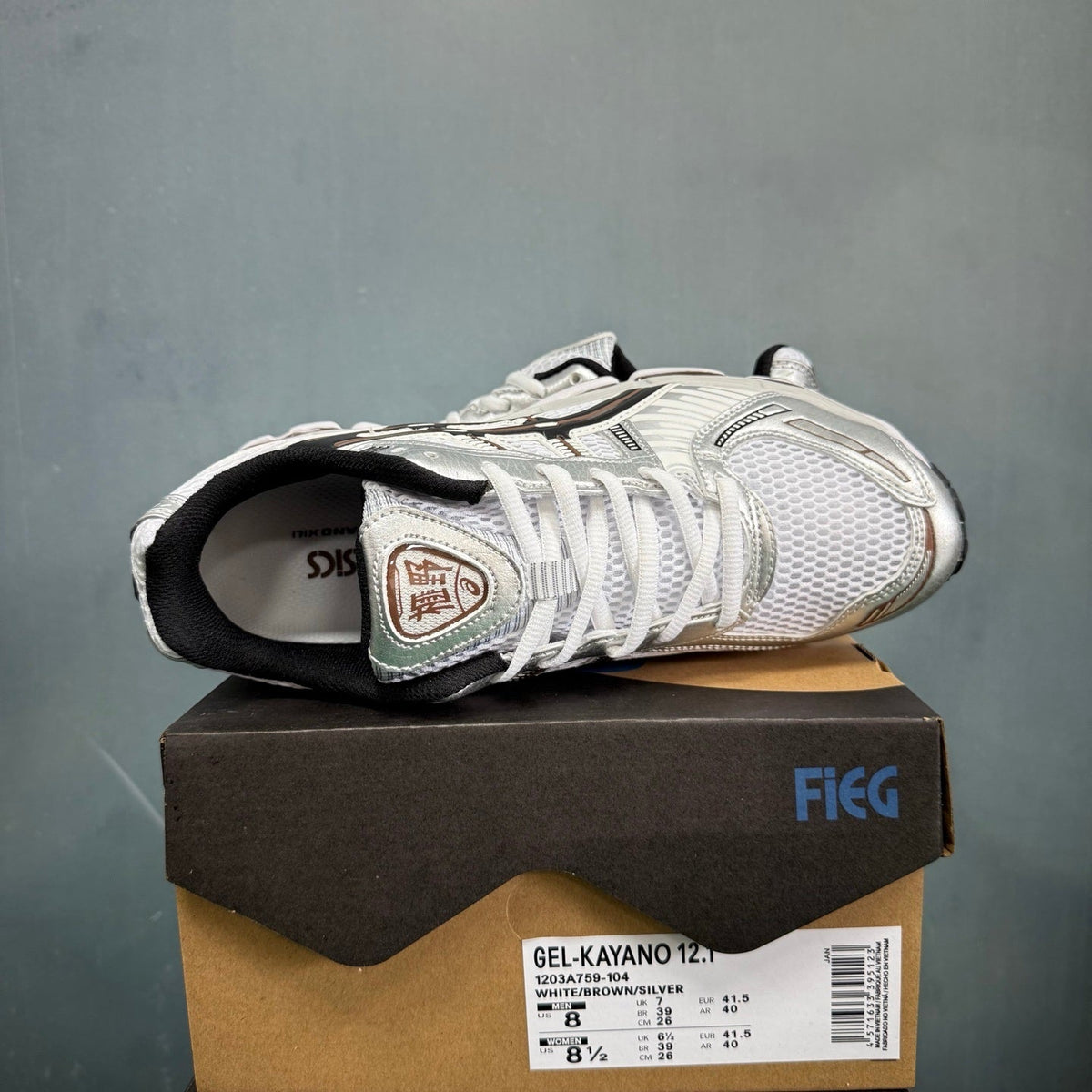 ASICS GEL-KAYANO 12.1 Sneakers in White Brown Silver 1203A759-104 - product image from the listing.