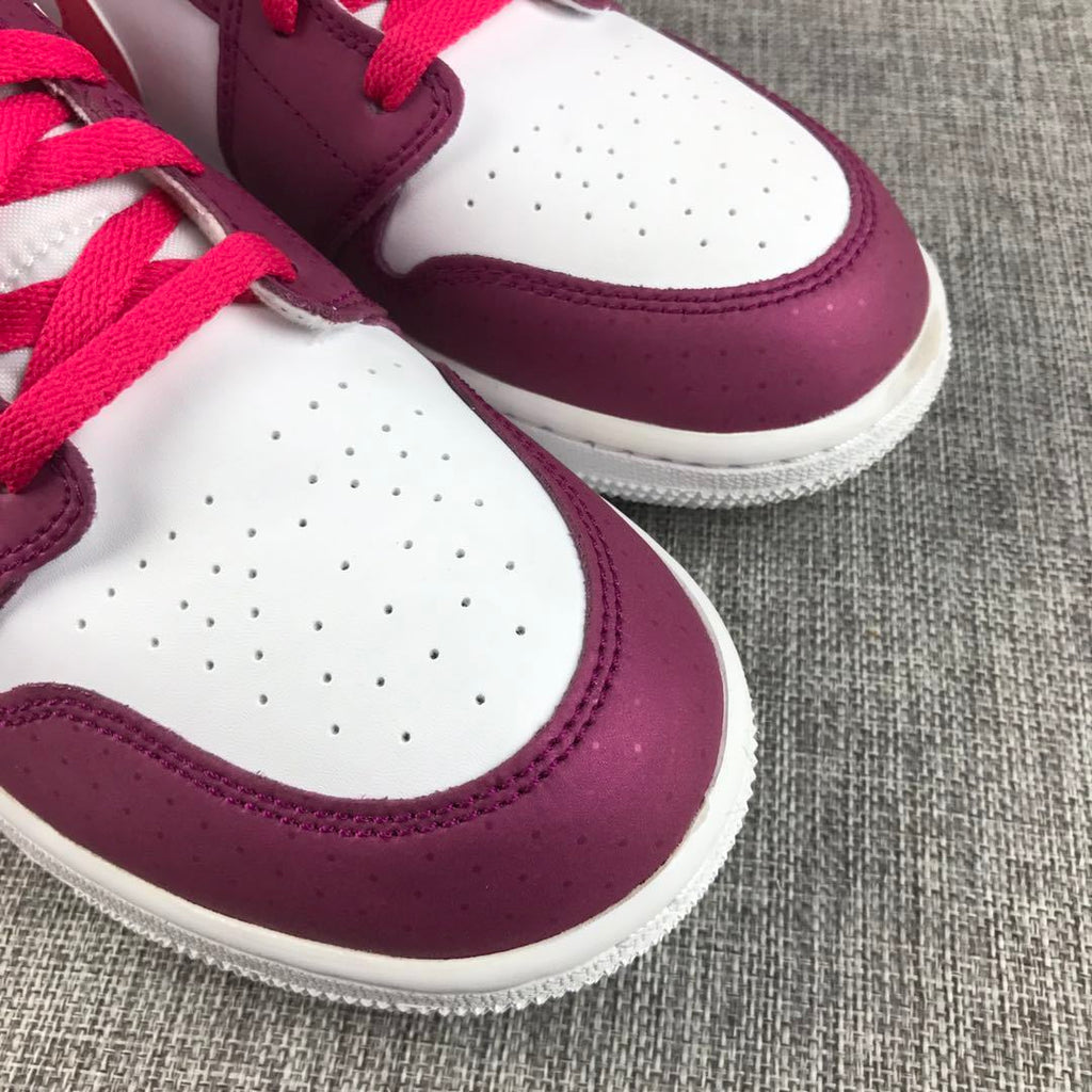 Air Jordan 1 High Sneakers in White, in Pink and Burgundy - product image from the listing.