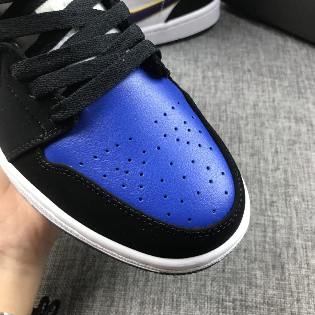 Air Jordan 1 Mid SE Sneakers in Black Purple Yellow 852542-005 - product image from the listing.