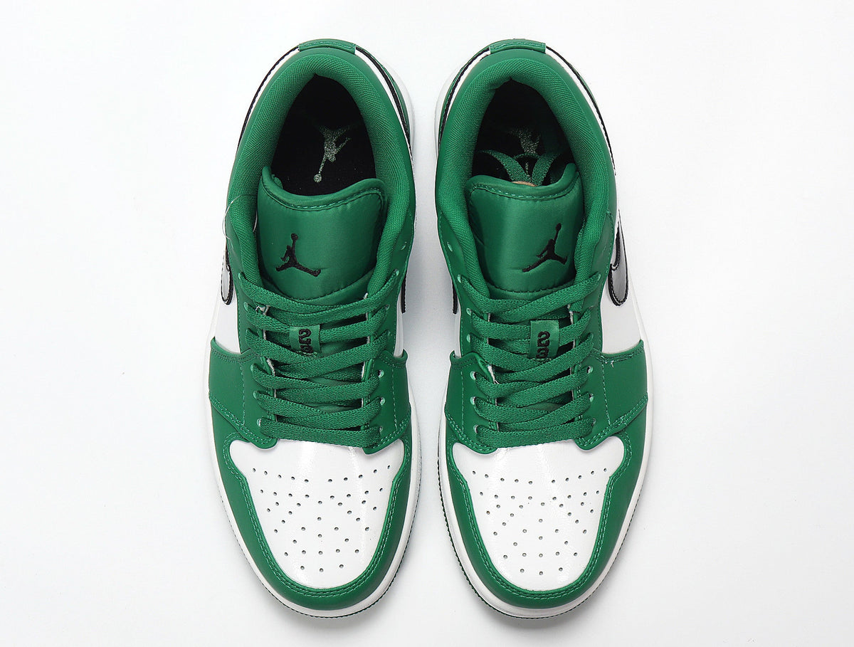 Jordan 1 Low Sneakers in White and Green 553558-301 - product image from the listing.