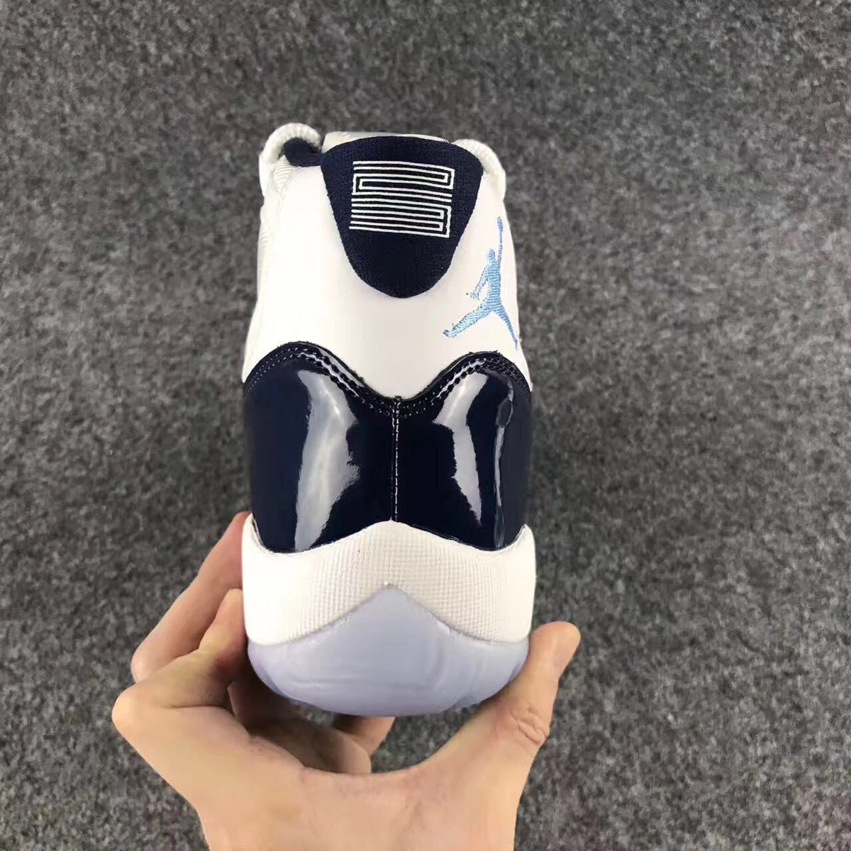 Jordan 11 Georgetown High-Top Sneakers in Navy - product image from the listing.