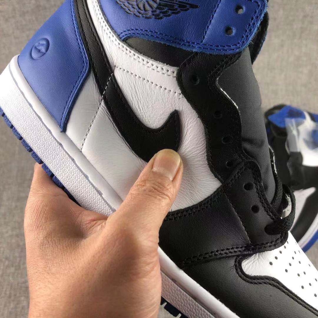 Jordan 1 Retro Fragment Sneakers in Black White Blue 716371-040 - product image from the listing.