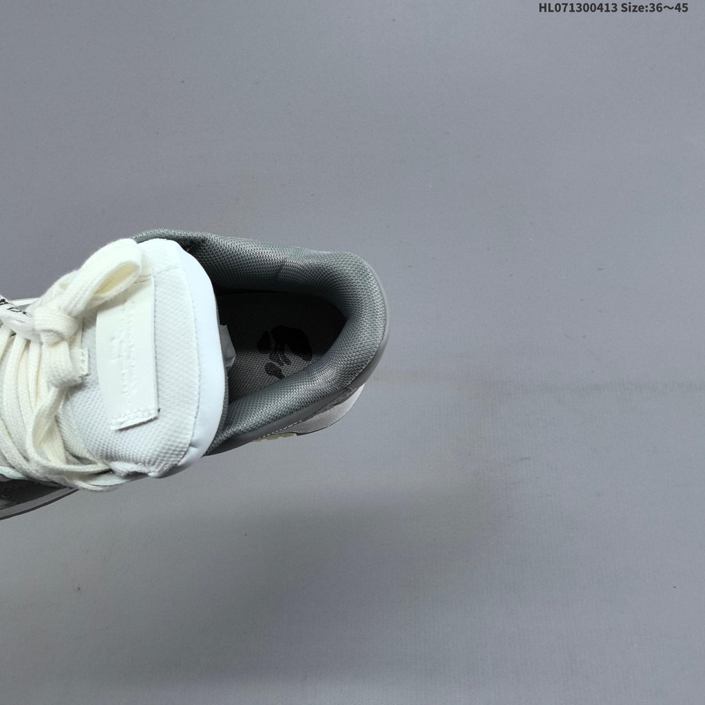 White and Grey Off-White Arrows Low-Top Sneakers - product image from the listing.