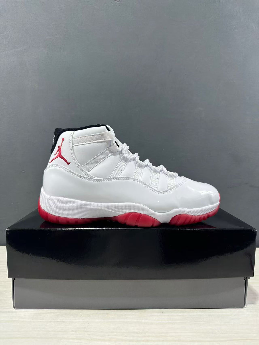 Air Jordan 11 Retro Low White Red CT8012-160 - product image from the listing.