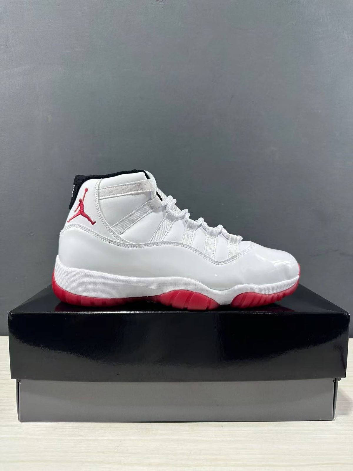 Air Jordan 11 Retro Low White Red CT8012-160 - product image from the listing.