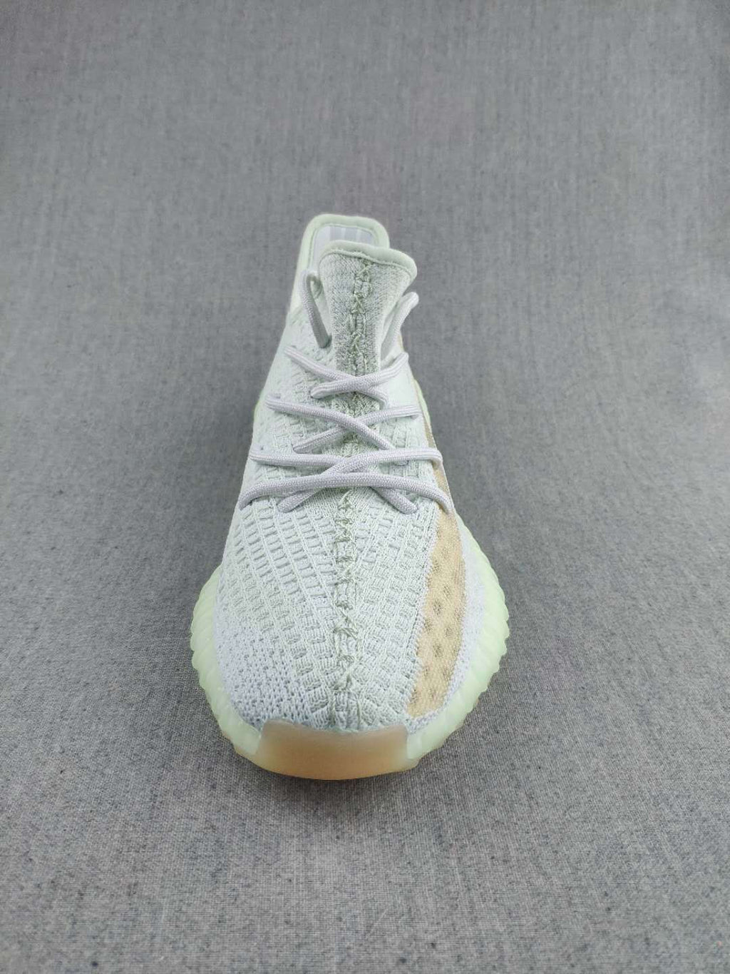 White and Tan Yeezy 350 V2 Knit Sneakers - product image from the listing.