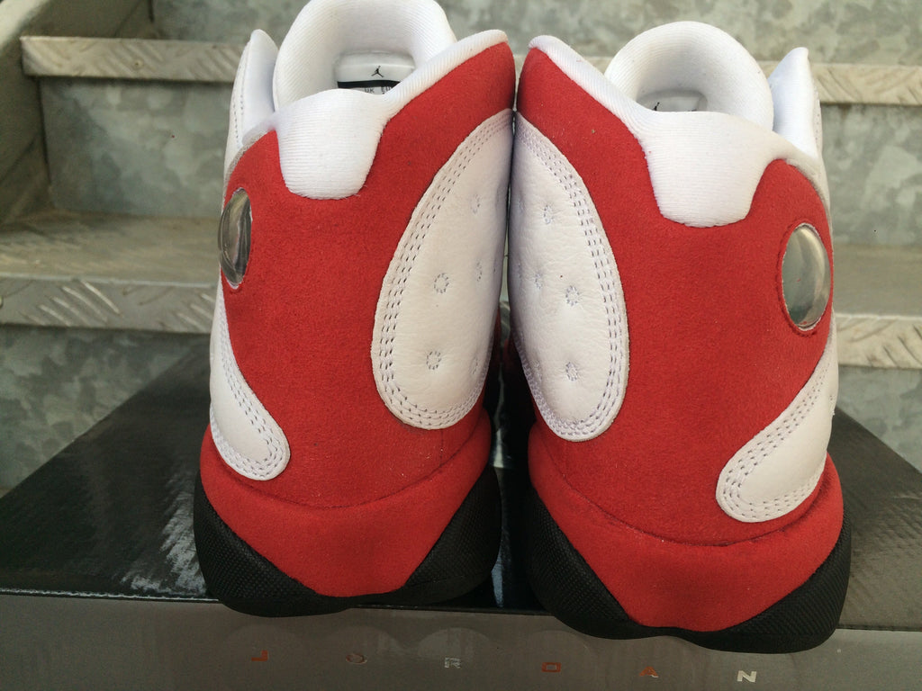 Air Jordan 13 Sneakers in White Red Black - product image from the listing.
