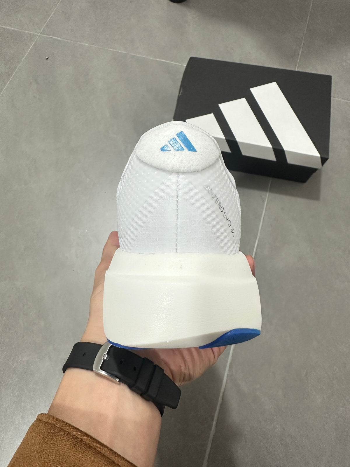 Adidas Lightstrike Pro Running Shoes in White Blue Red KJ3596 - product image from the listing.