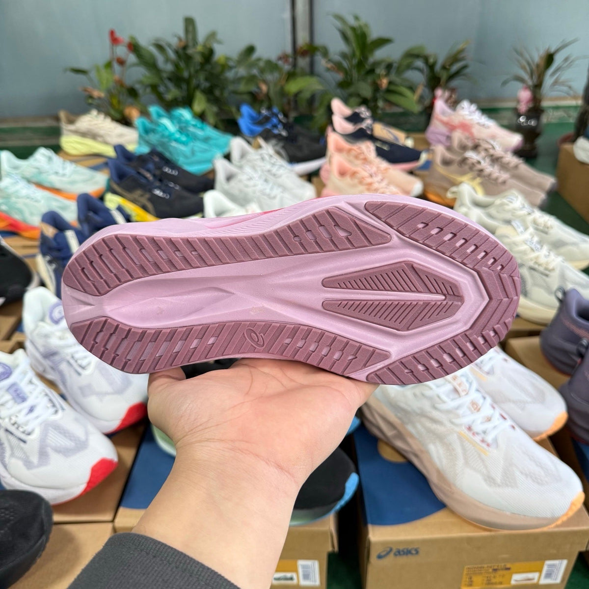 ASICS NOVABLAST 5 LE Running Shoes in Pink and Orange - product image from the listing.