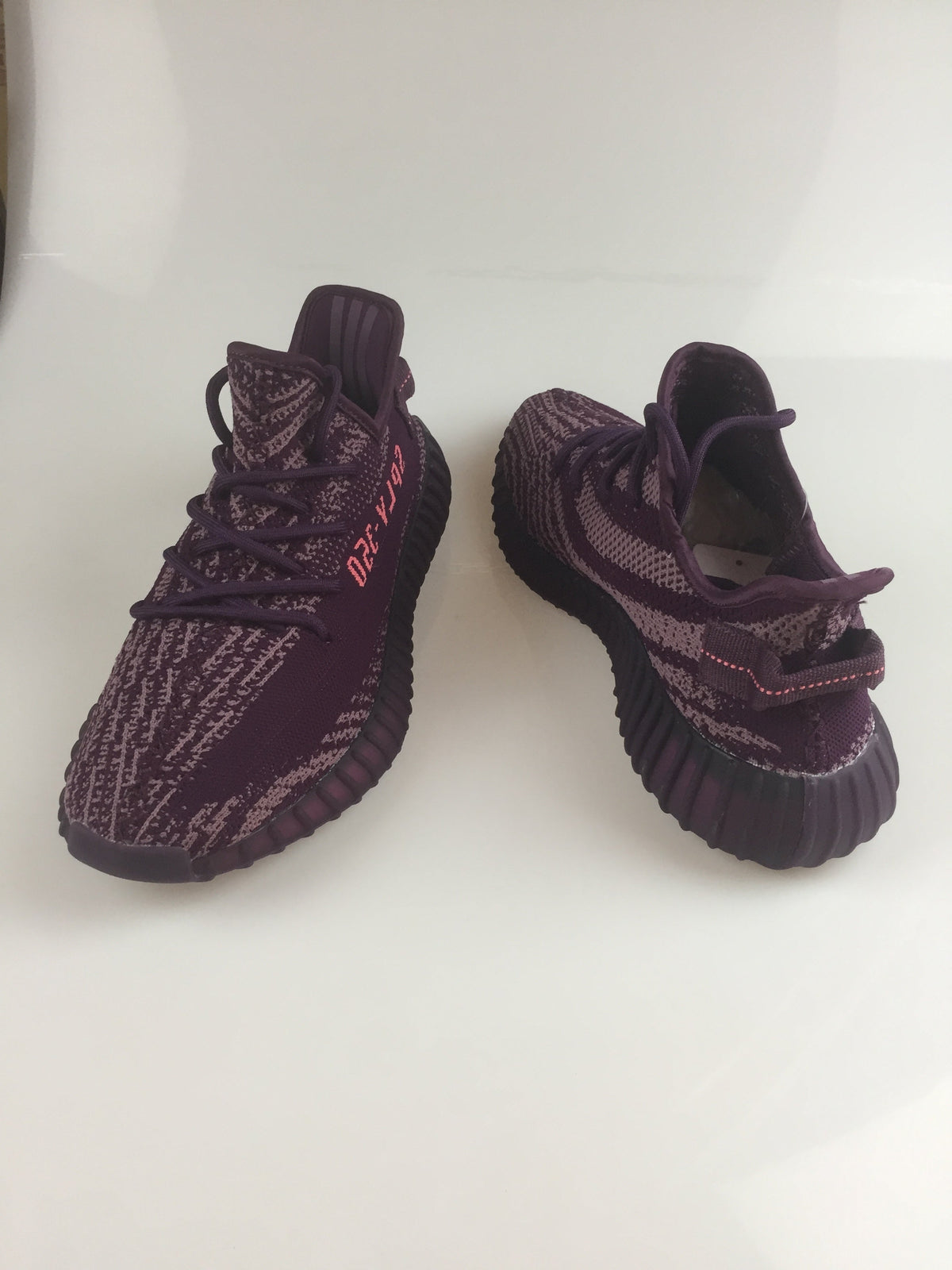 Black and Beige Yeezy 350 V2 Knit Sneakers - product image from the listing.