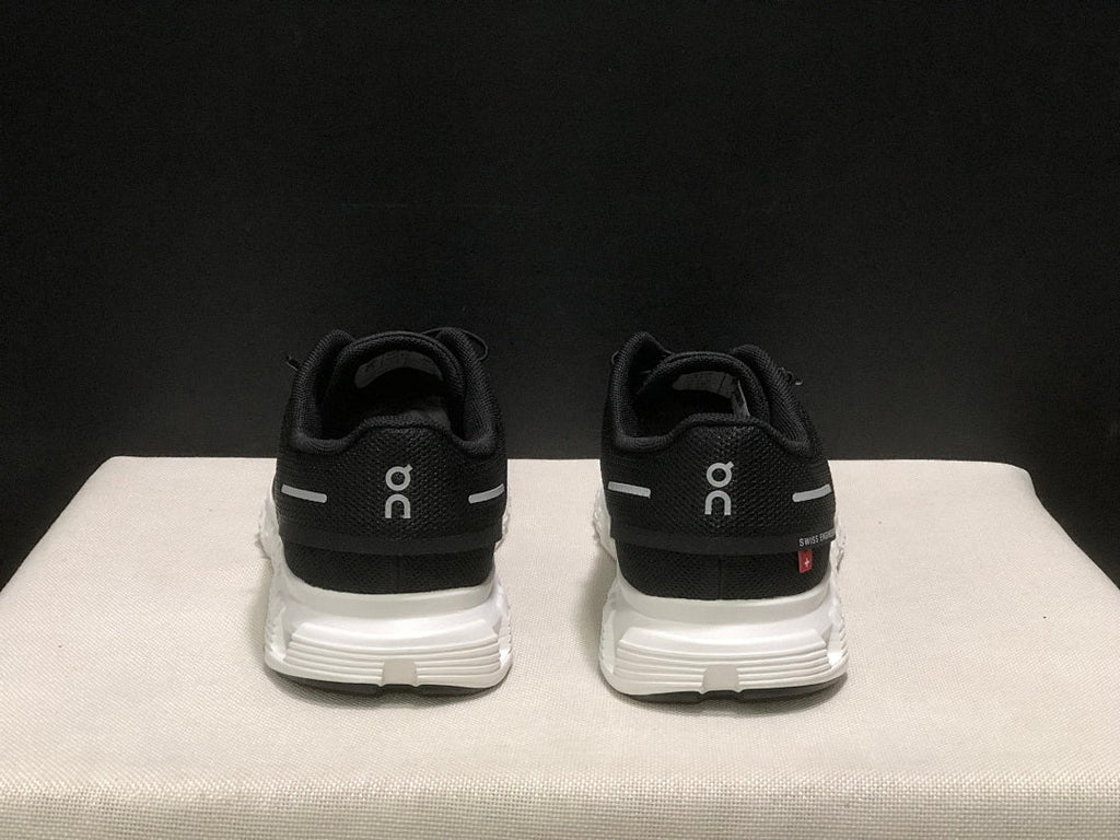 On Cloud 6 Running Sneakers in Black White - product image from the listing.