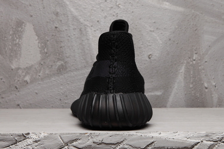 Yeezy 350 V2 Low-Top Sneakers in Black - product image from the listing.