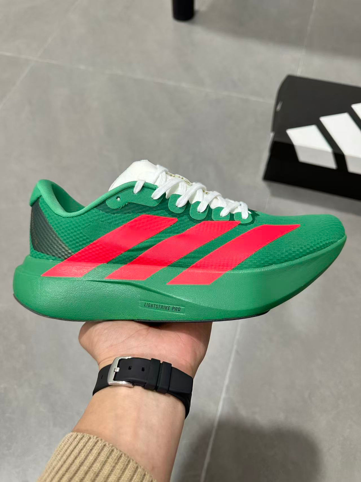 Adidas Lightstrike Pro Running Shoes in Green Red JQ4440 - product image from the listing.