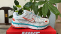 Nike P-6000 Sneakers in White Teal Orange BV1021-105 - product image from the listing.