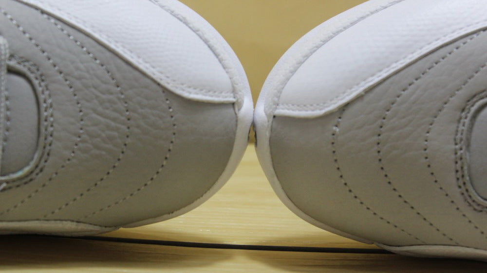Air Jordan 12 GreyBlue High-Cut Sneakers - product image from the listing.